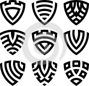 Stylized vector black shield icon set