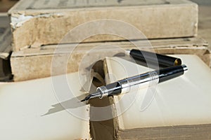 Stylographic pen and ancient manuscript