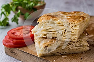 Su Boregi / Turkish Patty with greens and tomatoes.