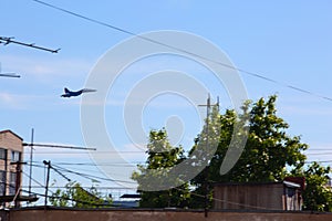 SU30-sm of the Russian air force flies over houses at a low altitude photo