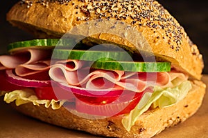 Sub sandwich with ham and fresh vegetable