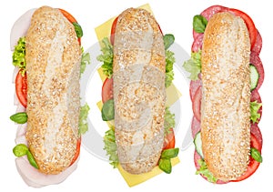 Sub sandwiches whole grains grain baguettes with ham salami cheese from above isolated on white