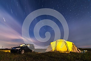 Subaru Forester at beach camping under stars