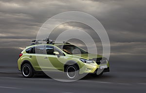 Subaru green car.