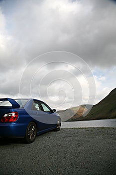 Subaru Impreza by the Lake in the Mountains