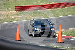 Subaru STi driving on Race Course