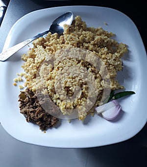Subcontinent food Khichri with fried egg and onion