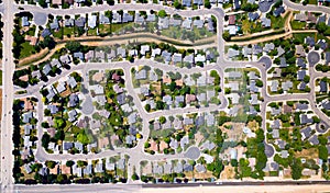 Subdivision seen from above with perfect streets and trees photo