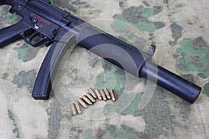 submachine gun MP5 with silencer photo