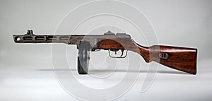Submachine gun ppsh-41 on a light background.