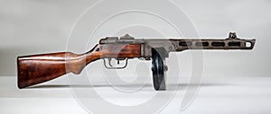 Submachine gun ppsh-41 on a light background.
