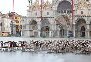 submerged chairs of alfresco pub in Saint Mark of Venice