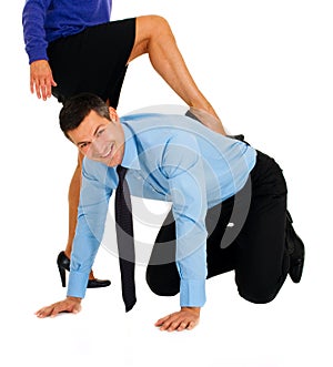 Submissive businessman at work photo