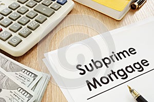 Subprime mortgage form and pen.