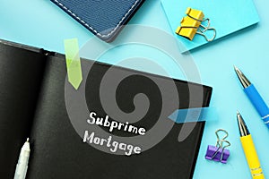 Subprime Mortgage sign on the piece of paper photo