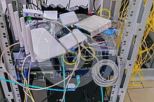 Subscriber terminals are tested in the server room of the data center. Experimental stand for testing internet connections. Many