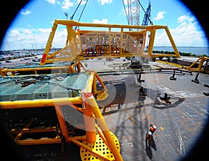Subsea manifold and several modules are lifted onto a barge.