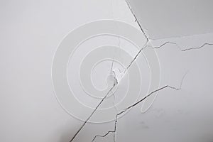 Subsidence crack around apex of wall and ceiling photo