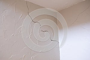 Subsidence crack in corner of wall and ceiling