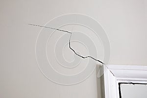 Subsidence crack by doorway in house