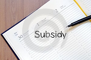 Subsidy write on notebook