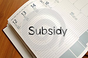 Subsidy write on notebook