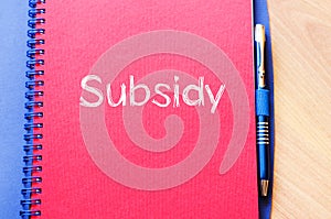 Subsidy write on notebook