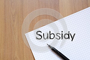 Subsidy write on notebook