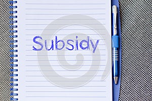 Subsidy write on notebook