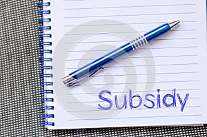 Subsidy write on notebook