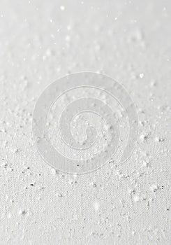 Subtle abstract textured background with organic light gray speckles and irregular patterns