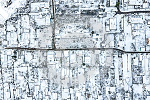 Suburb area in winter. houses under fresh snow. aerial view