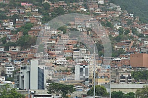 Suburb of La Guaira town near Caracas with poor family houses showing poverty and is situated on hill.