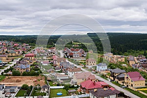 Suburban area currently under development with private houses at the edge of the forest
