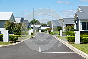 Suburban homes lining new orderly street