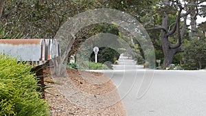 Suburban residential district street, California USA. Dropbox mailbox or postbox