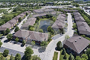 Suburban Townhouse Neighborhood Aerial with Pond