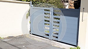 Suburbs house gray portal modern home steel door aluminum gate slats