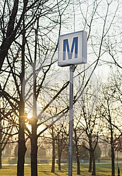 Subway sign in Bucharest, Romania in sunset light