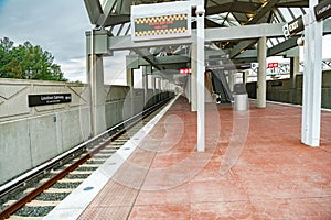 Subway station near Washington DC. Empty station with a view of the escalator and rails