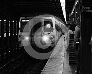 Subway train arriving at Penn Station.