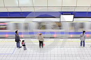 Subway train in motion arriving