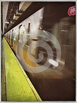Subway Train in Motion Arriving Old MTA Station Platform Fast Speed photo