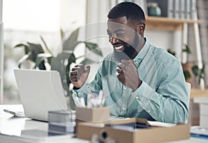 Success, black man and laptop to celebrate business profit, win or achievement in an office. African male entrepreneur