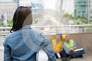 success boss concept : woman engineer standing lazy foreman sleeping work time