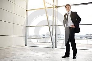 Success breeds confidence. Full length portrait of a businessman standing in the lobby.