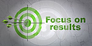 Business concept: target and Focus on RESULTS on wall background