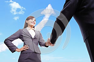 Success Business concept - woman and man handshake