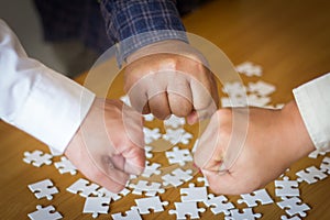 Success Business Partners Giving Fist Bump after Complete a Deal