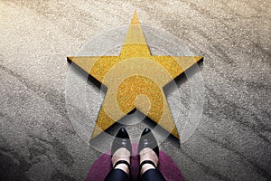 Success in Business or Personal Talent Concept. Top View of Business Woman in Working Shoes Standing in front of a Golden Star.